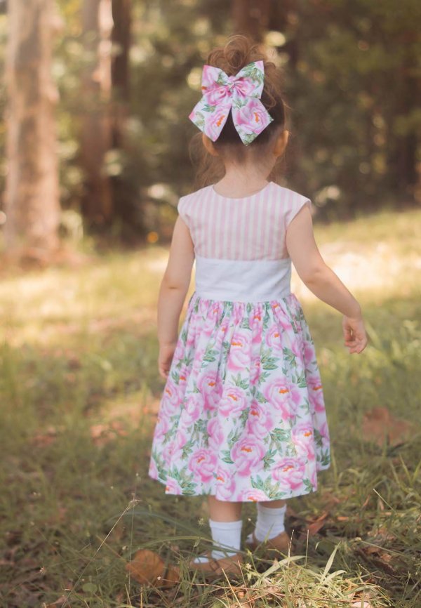 Opal little girls dress with striped top and flowered skirt, matching hair bow